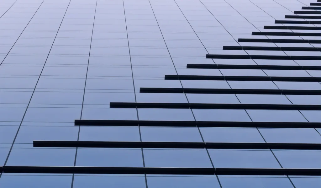 An abstract photo of a glass building. A macro of its texture.