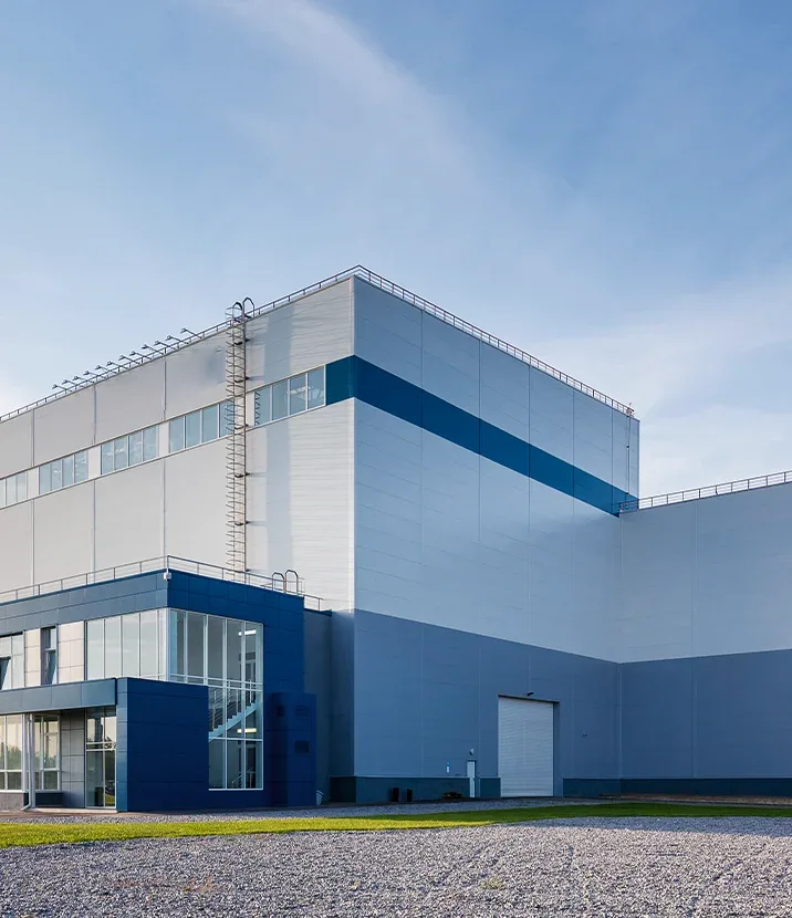 An outdoor photo of a warehouse or similar building.
